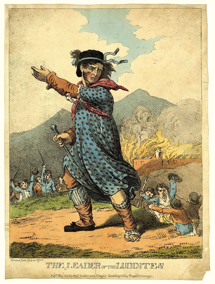 Hand-coloured 1812 satirical print of a man in a dress and cap, arm outstretched, with a burning mill and rioters behind him, titled The Leader of the Luddites.
